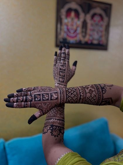 A creative pose showing the back of one hand and the front of the other, highlighting different aspects of the design.