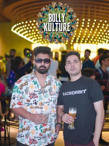 Posing with a friend at Bolly Kulture night.