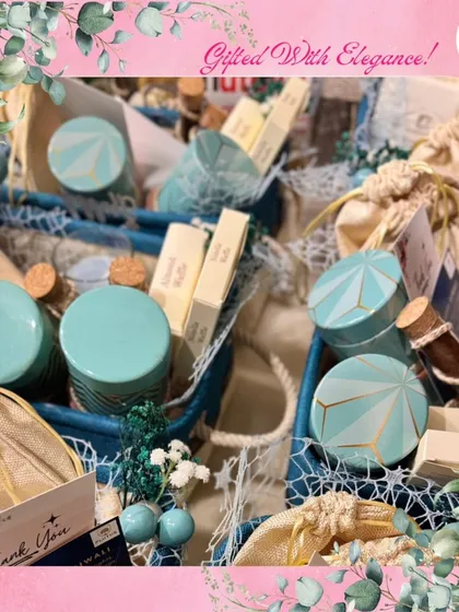 Gifting with elegance is easy with these precious hampers. This image shows two baskets filled with curated items in a lovely blue and white color scheme, perfect for a baby shower or a sophisticated thank you gift.