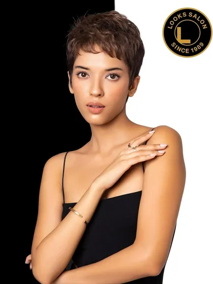 Another portrait of the model with her stylish pixie cut, demonstrating how a great cut can accentuate facial features.