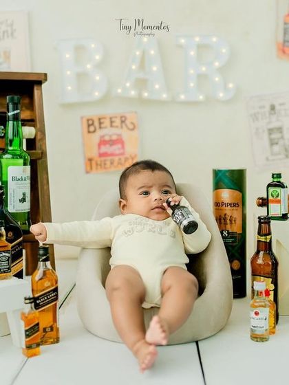 Kicking back and enjoying the atmosphere. This shot captures the relaxed and humorous vibe of the entire bar-themed session.