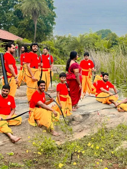Students relax by the lotus pond at our Gurukulam. The serene, natural surroundings of our Tirupati retreat are an essential part of the learning process, helping to calm the mind and connect with nature.