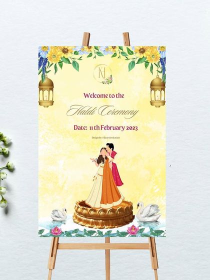 A bright and joyful welcome sign for a Haldi ceremony. The sunny yellow watercolor background is adorned with floral motifs, lanterns, and a sweet illustration of the couple during their Haldi festivities, surrounded by swans.