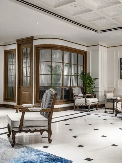 The VRS Office in New Delhi showcases our ability to blend classical elegance with modern functionality. We used timeless elements like fluted mouldings, coffered ceilings, and curved glass partitions to create a workspace that feels sophisticated, balanced, and enduring.