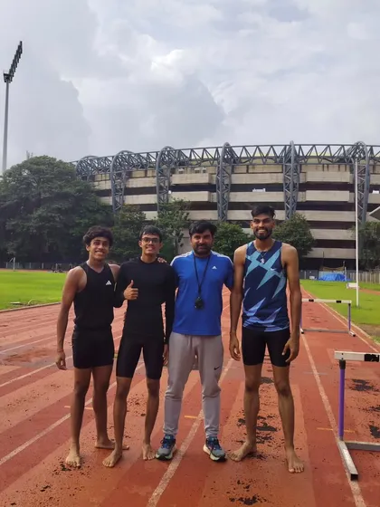 With my boys on the track, preparing them for the next level of competition.