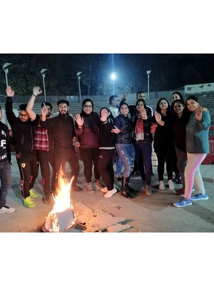 Our members and staff cheering during the Lohri celebration, complete with dhol drummers.