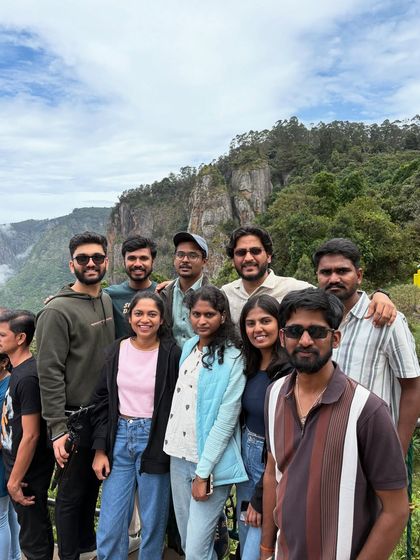 A group photo at a viewpoint in Kodaikanal.