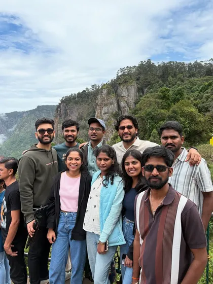 A group photo at a viewpoint in Kodaikanal.