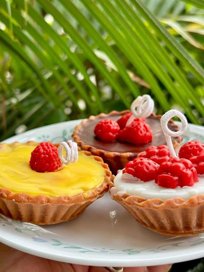 A trio of my yummy tart candles. You can get your pick from chocolate, lemon, or mixed berry. They are a fun and quirky addition to any space.