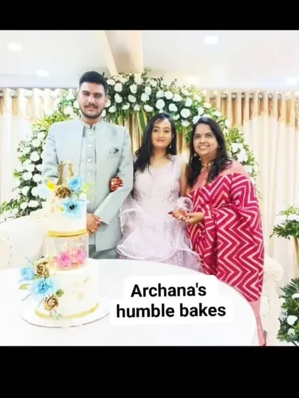 Me with the gorgeous couple and their engagement cake. It's an honor to be part of their special day.