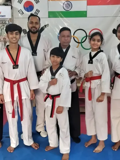 The road to black belt is a challenging but rewarding one. This is our group of dedicated students after successfully completing their red belt test, the final step before their black belt exam.