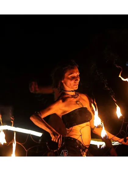 My event photography is all about capturing energy. Here, a fire dancer is frozen in motion against the night sky, showcasing my ability to handle dramatic, low-light situations and create powerful images.