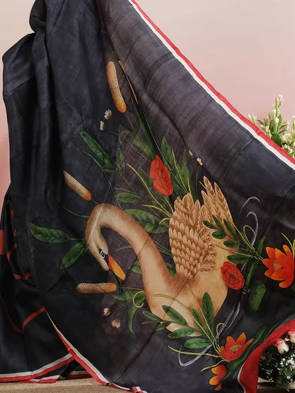 A close-up of the hand-painted swan, a beautiful detail that makes this saree truly special.