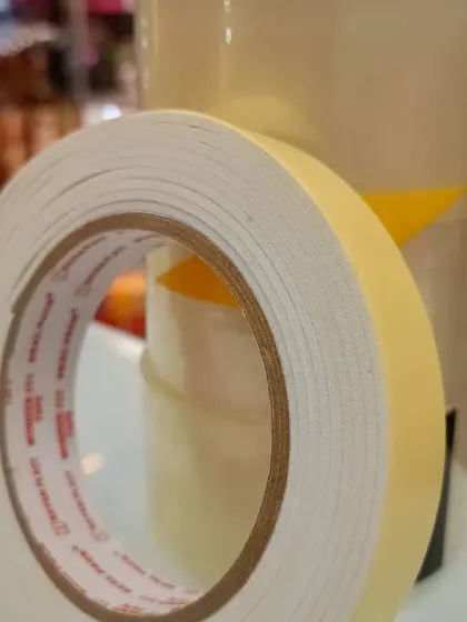 A detailed shot of our double-sided foam tape. You can see the texture and quality that makes it a favorite among event planners.