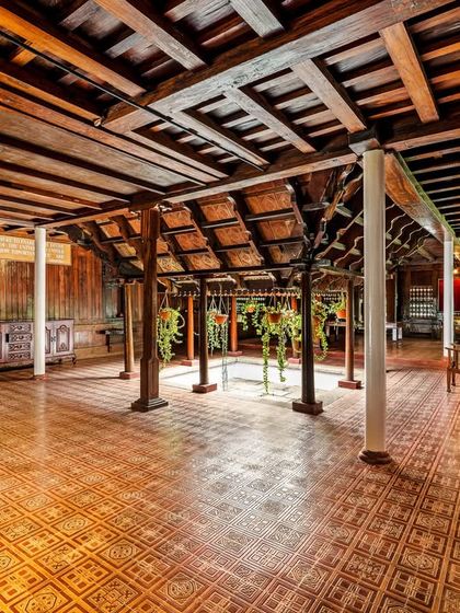 The central atrium of the Aranmula Palace, an open-to-sky courtyard that is a characteristic feature of Nalukettu architecture. This design element brings natural light and air into the heart of the building.