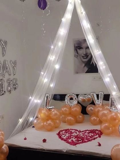 A final look at the intimate and beautifully lit bed canopy decoration.