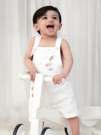 A huge, joyful laugh from a little boy playing with his walker. Capturing these moments of pure happiness is what I love most about my job.