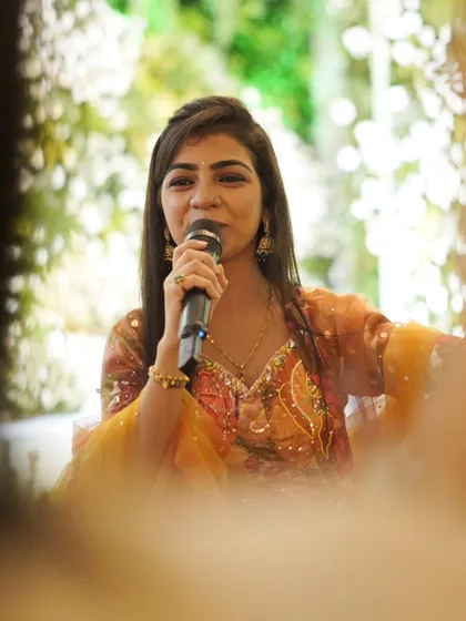 A candidly captured shot while performing. This is me, singing with all the love in my heart.