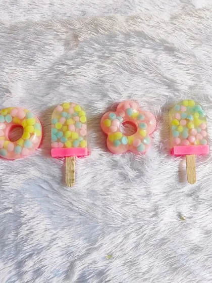 A fun set of candy-themed soaps, including donuts and popsicles.