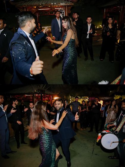 The couple owning the dance floor at their cocktail party.