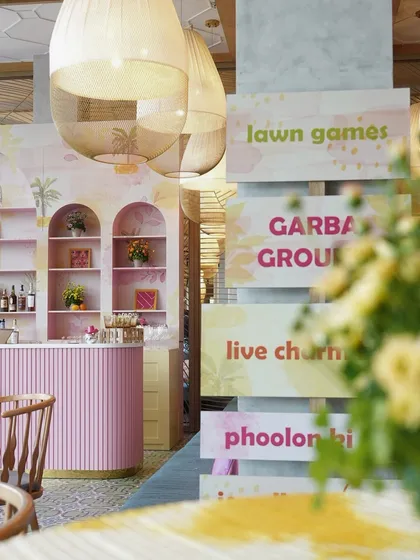 Even daytime events can have curated entertainment. For this Haldi, we organized a schedule of activities including lawn games, a garba group, and live music to keep guests engaged and entertained.