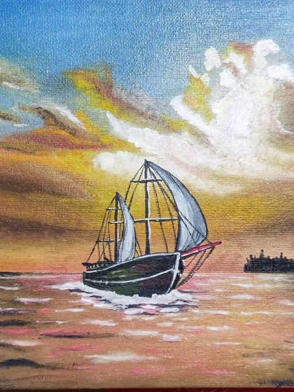An older oil on canvas piece depicting a ship at sunset. I enjoy painting seascapes, capturing the mood of the water and sky.