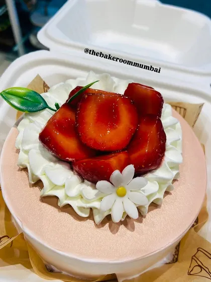 A cute and pretty Strawberry Bento Cake, perfect for the Christmas season or any celebration. It's topped with fresh strawberries and delicate sugar flowers.