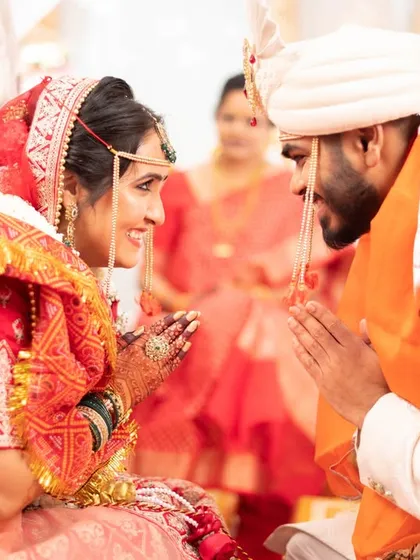 A moment of mutual respect and greeting between the bride and groom during their wedding ceremony.