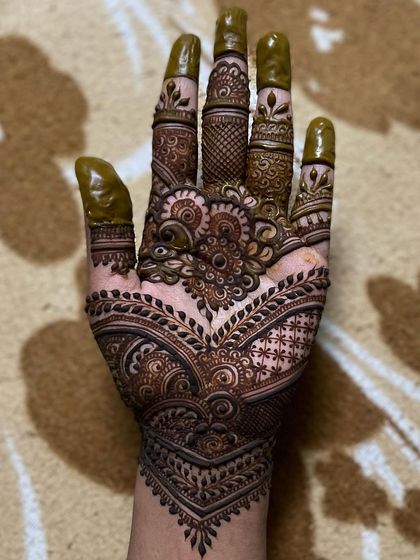 Intricate Full Hand Mehendi photo 41