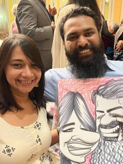 This couple's caricature captures their fun-loving spirit. It was a pleasure drawing them at the Sheraton.