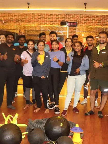 Our crew after a tough workout. We believe that together, everyone achieves more. This is our fitness family, a mix of men and women who support each other every step of the way.
