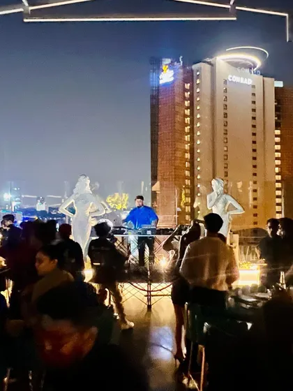 Another angle from a rooftop gig at the Conrad in Bangalore. The combination of an open sky, city lights, and deep house music is a vibe you have to experience.