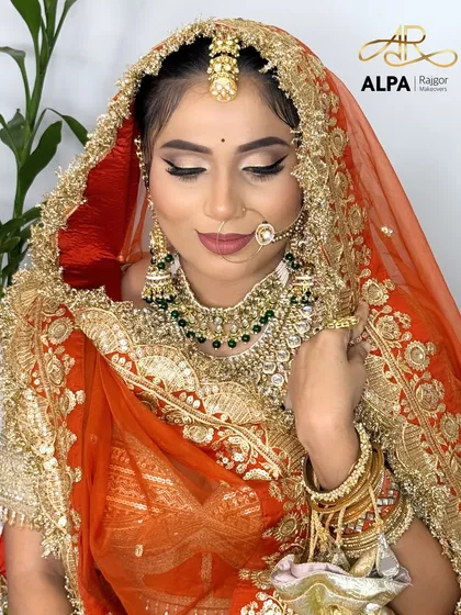 A moment of quiet reflection, showing the soft glam of the eye makeup and the smooth finish of the base.