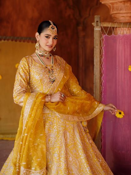 A full view of this heritage look. The makeup is designed to photograph beautifully, capturing all the intricate details of the outfit.