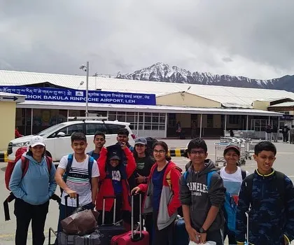 Our team arrives at the airport in Leh, ready to begin their high-altitude training in Ladakh. The journey itself is part of the adventure and team-building experience.