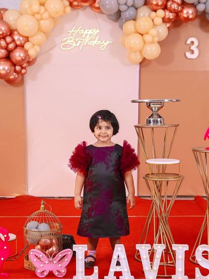 A playful 'Masha and the Bear' themed birthday party, with forest decor, character cutouts, and colorful balloons, perfect for a fun-filled adventure.