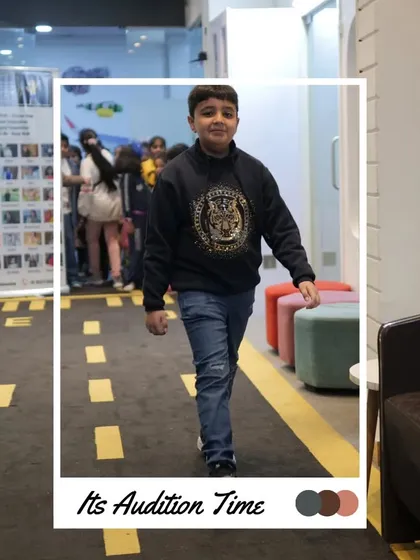 This participant is all set for his audition, showing off his walk down our practice runway.