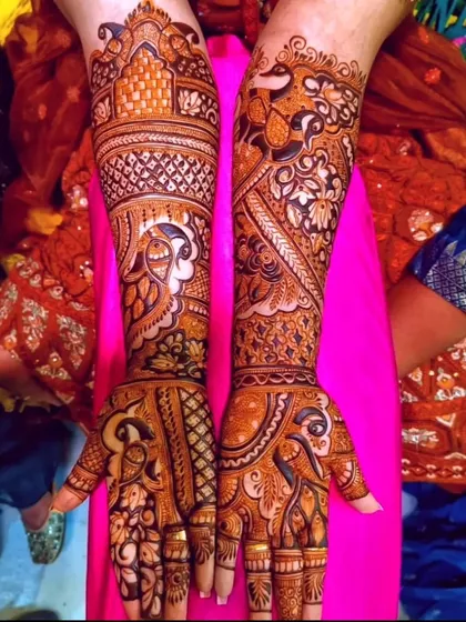 A unique design with a mix of different styles. It combines traditional peacock and elephant figures with more abstract and modern patterns.
