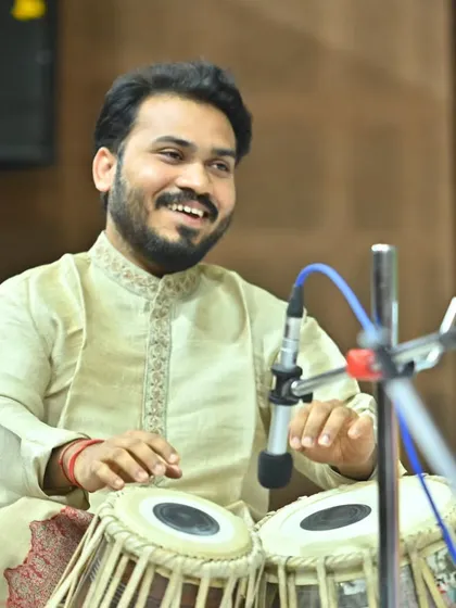 Pictures from the Komal Nishad concert, providing tabla accompaniment for Pandit Debashish Bhattacharya ji on the slide guitar.