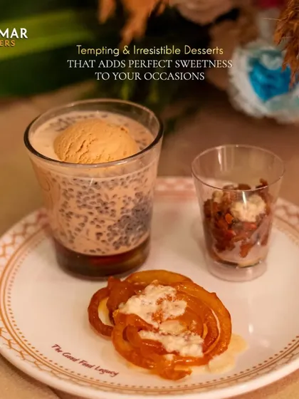 A tempting plate of our best desserts, including falooda with ice cream, jalebi with rabdi, and a chocolate nut cup.