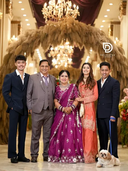 From first birthdays to silver anniversaries, I am here to document all of your family's most important milestones. This is a beautiful family portrait from a 25th anniversary celebration.