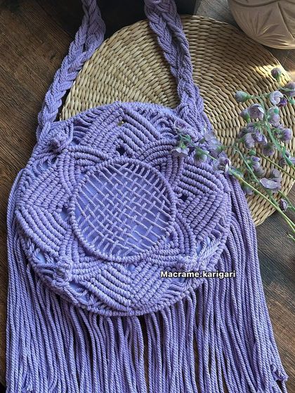 For those who love a pop of color, we offer our round macramé bag in this lovely lavender shade. It's a unique and eye-catching piece for your collection.