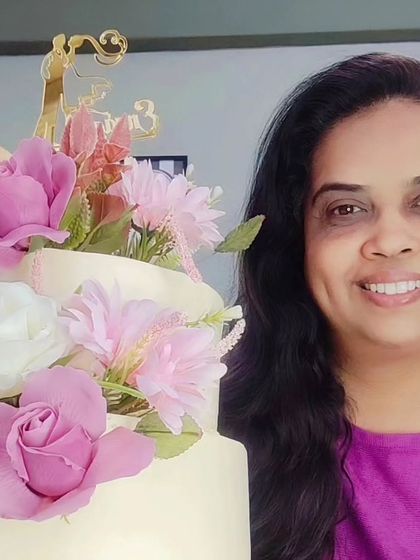 Me with a lovely two-tiered floral engagement cake.