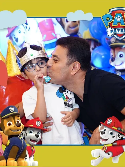 A precious moment between father and son at a Paw Patrol birthday party. These are the memories that families will cherish for years to come.