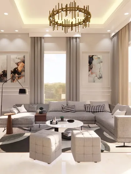 This is an example of how I use a neutral color palette to achieve a sophisticated and timeless look. The open-plan living area is filled with natural light, highlighting the clean lines, plush grey sectional sofa, and elegant wall paneling that add character without overwhelming the space.