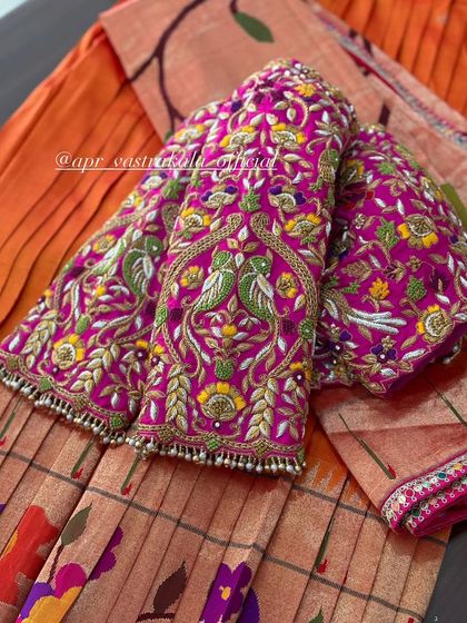 Another view of the vibrant pink embroidered sleeves.