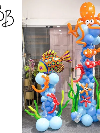 I am big on details, and these "Under The Sea" balloon towers are a testament to that. I sculpted an entire ecosystem with colorful fish, an octopus, seahorses, and starfish, creating a vibrant and engaging decoration that invites you to look closer.