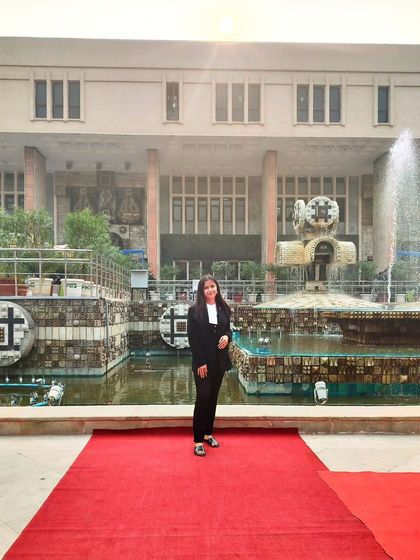 Standing on the red carpet at the Delhi High Court, ready for the year ahead. This building represents the pursuit of justice, and I'm proud to do my part here.