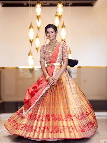 A joyful, twirling shot that captures the beauty of the traditional lehenga.