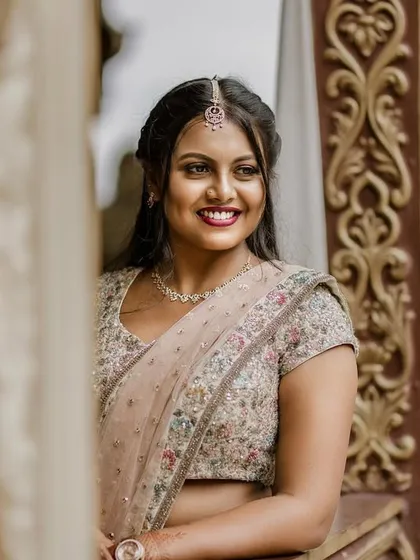 A candid photo from my own engagement shoot. I created a soft, romantic look for myself with a berry lip and defined eyes that felt both special and natural.